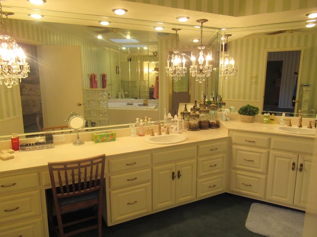 bathroom featuring vanity and a chandelier