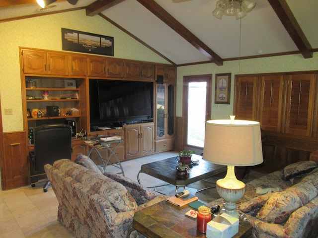 living room with ceiling fan and lofted ceiling with beams