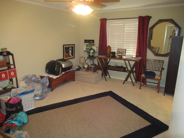 bedroom featuring carpet floors, crown molding, and ceiling fan