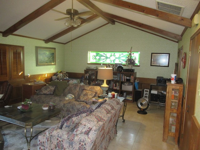 tiled living room with lofted ceiling with beams and ceiling fan