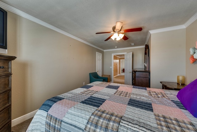 bedroom with ceiling fan, crown molding, carpet floors, and a textured ceiling