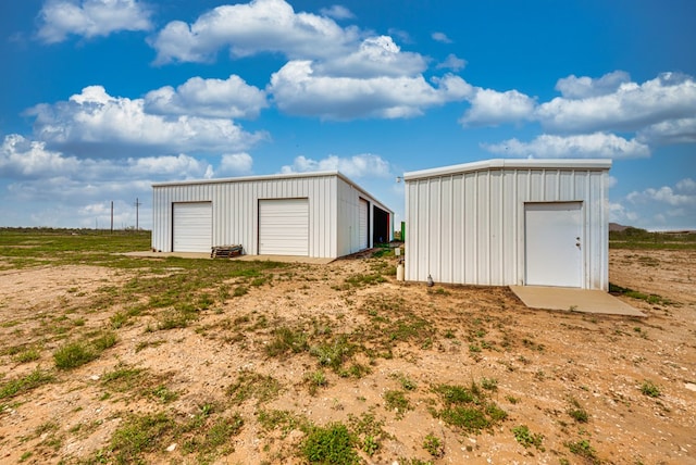 view of outbuilding with a garage