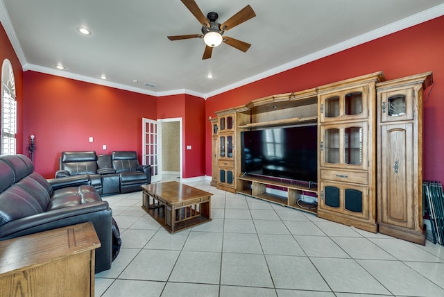 living room featuring ceiling fan, light tile patterned flooring, and crown molding