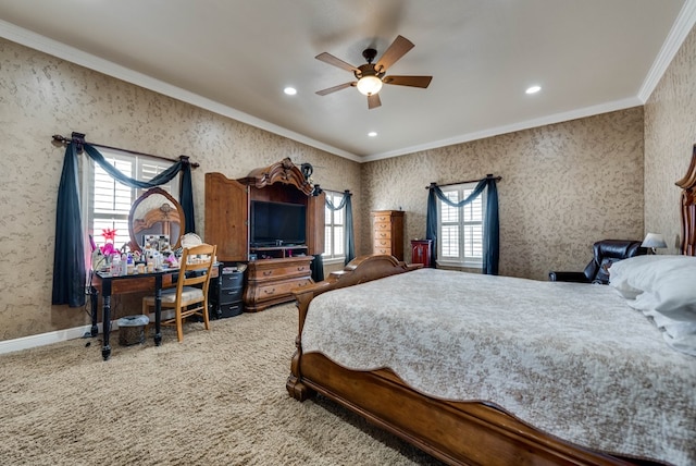 bedroom with carpet flooring, multiple windows, ceiling fan, and crown molding