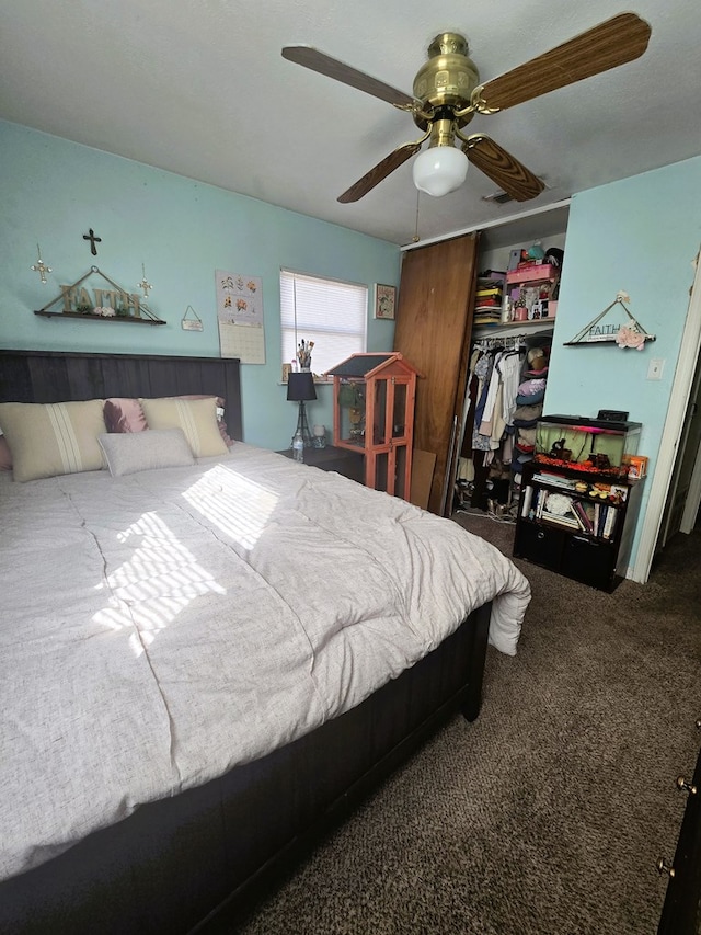 carpeted bedroom with a closet and ceiling fan