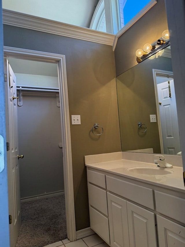 bathroom featuring tile patterned floors and vanity