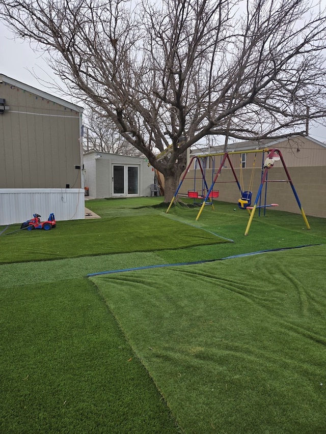 view of yard with a playground