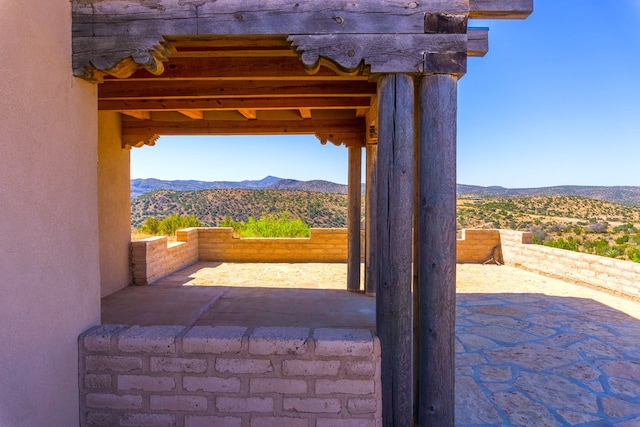 view of patio with a mountain view