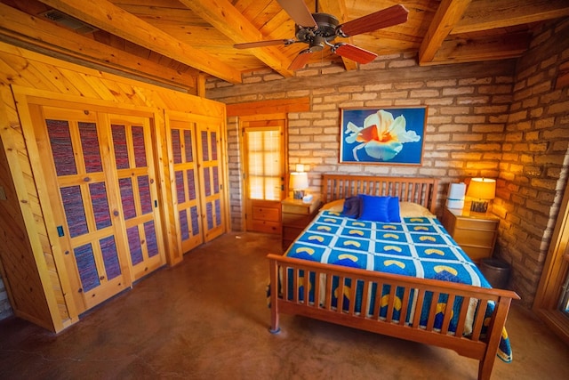 bedroom featuring beam ceiling, ceiling fan, wood ceiling, and dark carpet