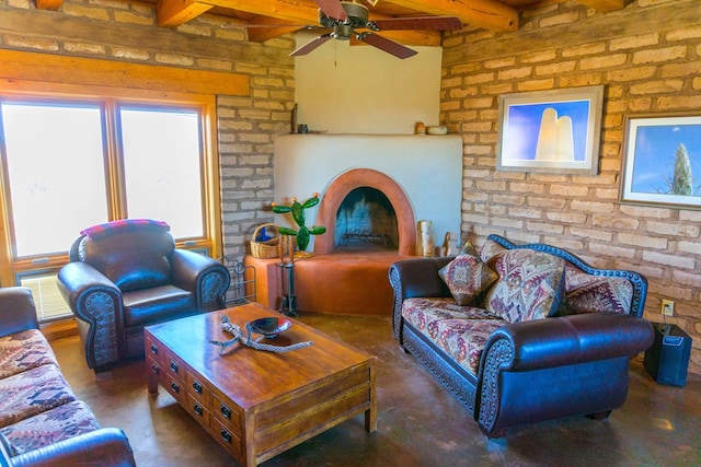 living room featuring ceiling fan, hardwood / wood-style floors, and beamed ceiling