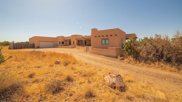 view of front of home featuring a garage