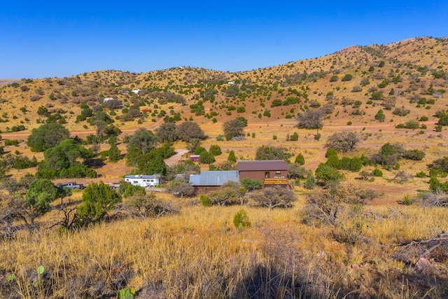 view of mountain feature with a rural view