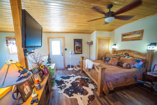 bedroom with ceiling fan, dark hardwood / wood-style flooring, and wood ceiling