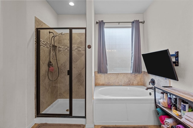 bathroom with independent shower and bath