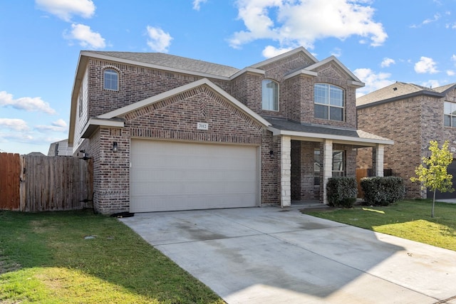 front of property with a garage and a front lawn