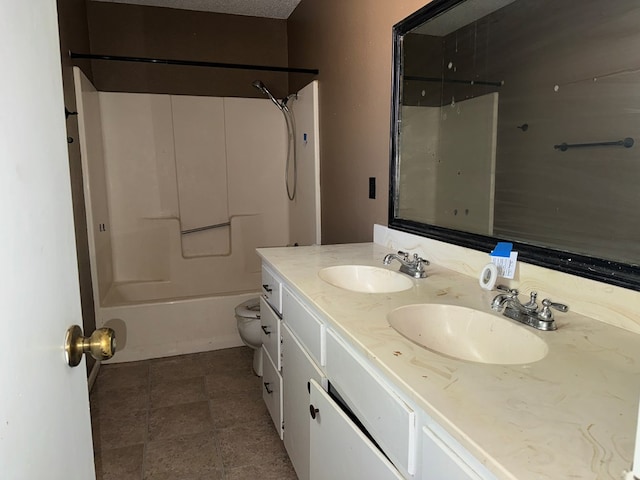 full bathroom featuring bathing tub / shower combination, vanity, and toilet