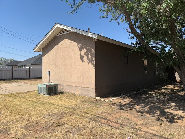 view of property exterior featuring central AC unit