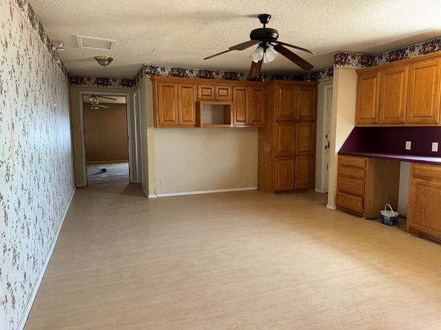 kitchen with a textured ceiling