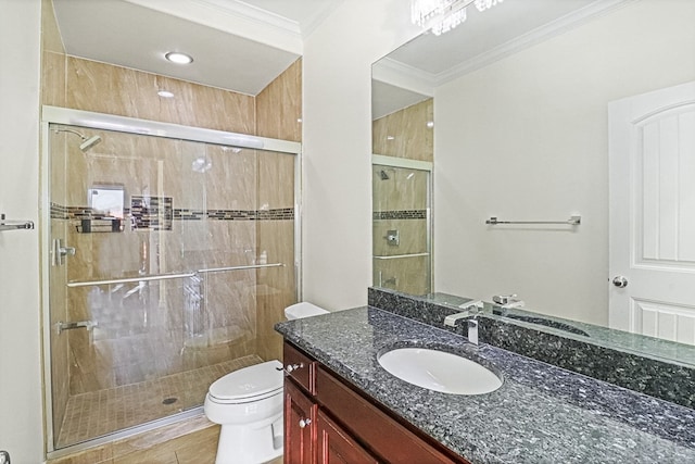 bathroom featuring toilet, vanity, walk in shower, crown molding, and hardwood / wood-style flooring