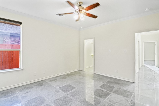 spare room featuring ceiling fan and ornamental molding