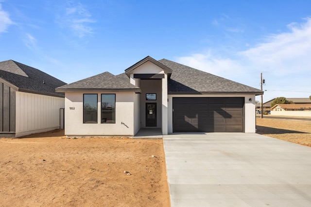 view of front of home with a garage