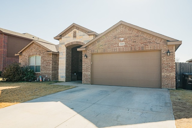 view of front of home with a garage