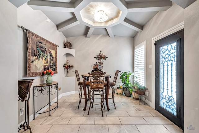 dining area with light tile patterned floors, beamed ceiling, and baseboards