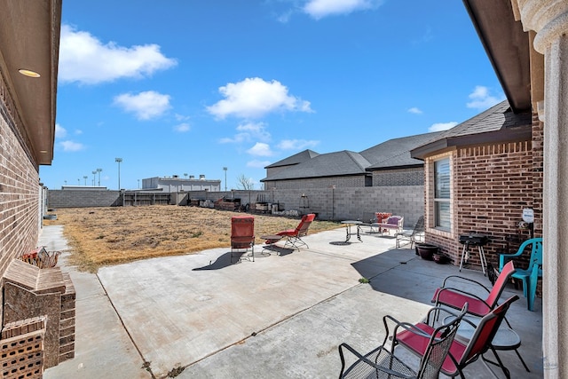 view of patio with a fenced backyard