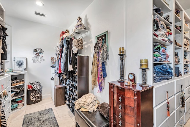 walk in closet with tile patterned floors and visible vents