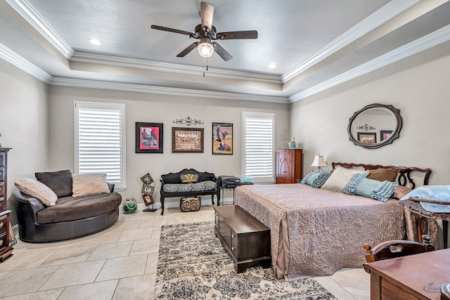 bedroom featuring light tile patterned floors, a tray ceiling, and ornamental molding