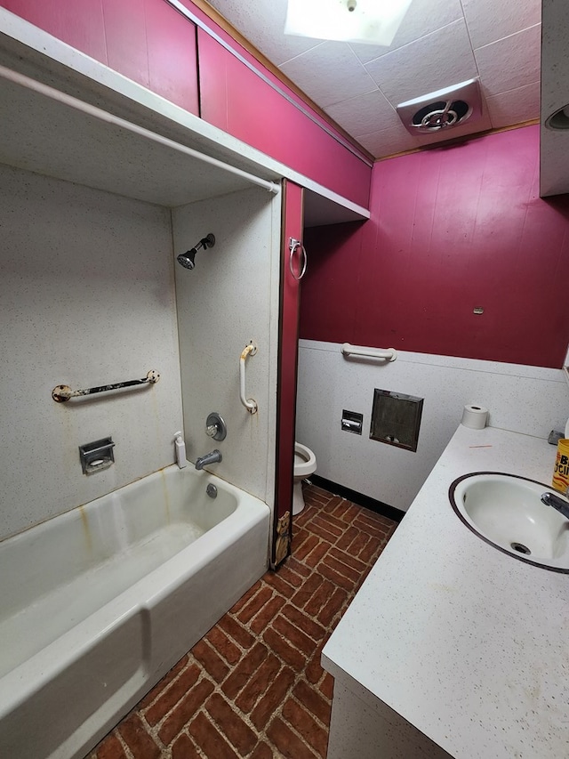 full bathroom featuring vanity, toilet, and shower / bath combination