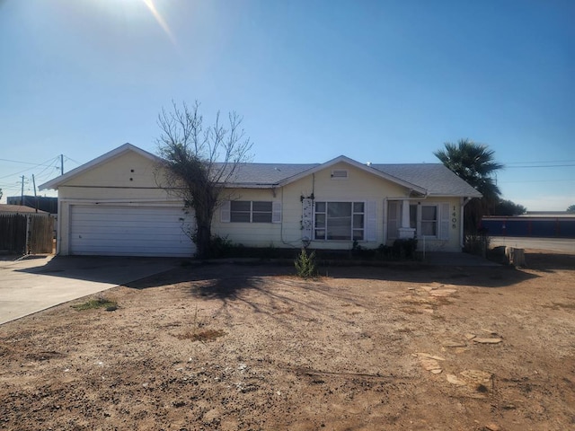 single story home with a garage