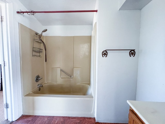 bathroom with bathtub / shower combination and vanity