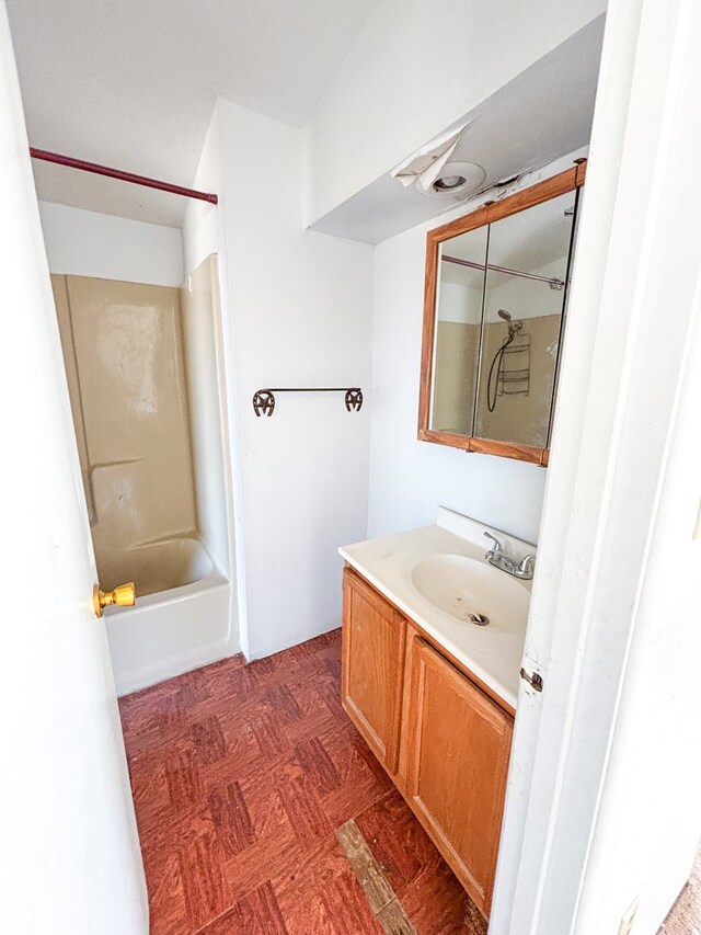 full bathroom with tub / shower combination and vanity