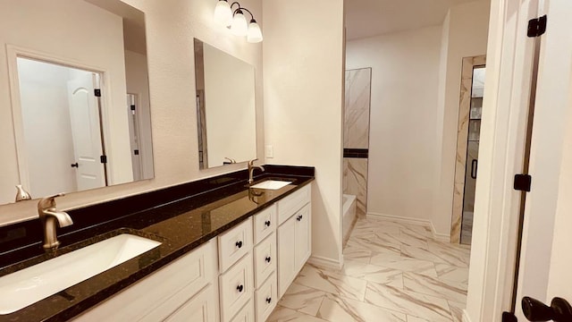 bathroom featuring vanity and walk in shower