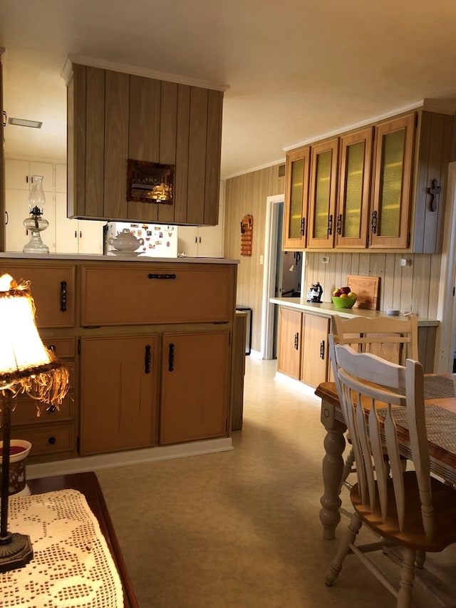 kitchen featuring a notable chandelier and light carpet