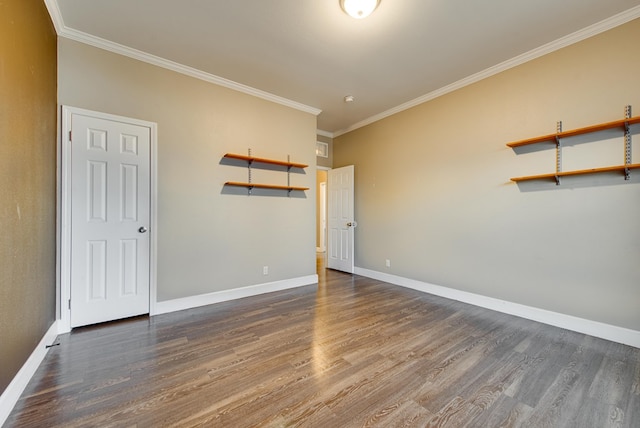 unfurnished bedroom with crown molding and dark hardwood / wood-style floors