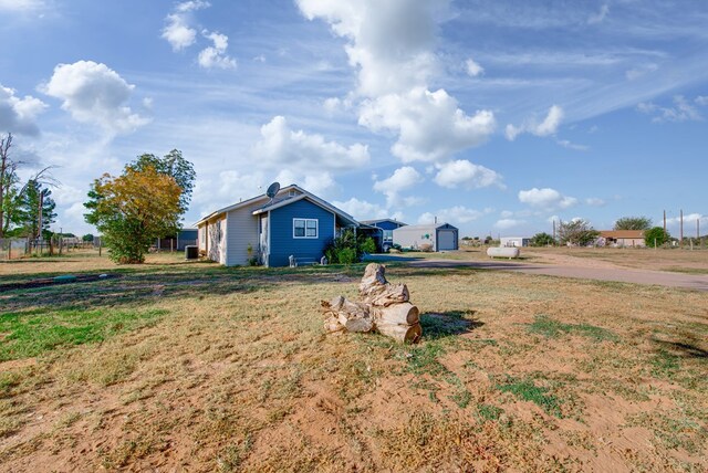 view of yard with a garage