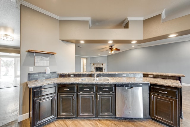 kitchen with light hardwood / wood-style flooring, stainless steel dishwasher, ceiling fan, and sink