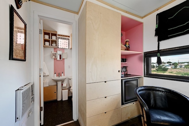 kitchen featuring heating unit and open shelves