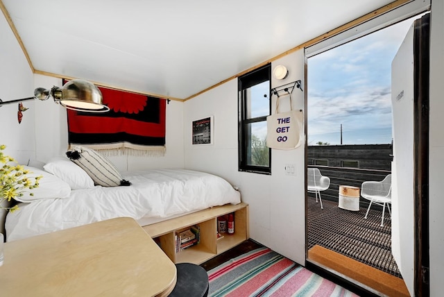 bedroom featuring crown molding