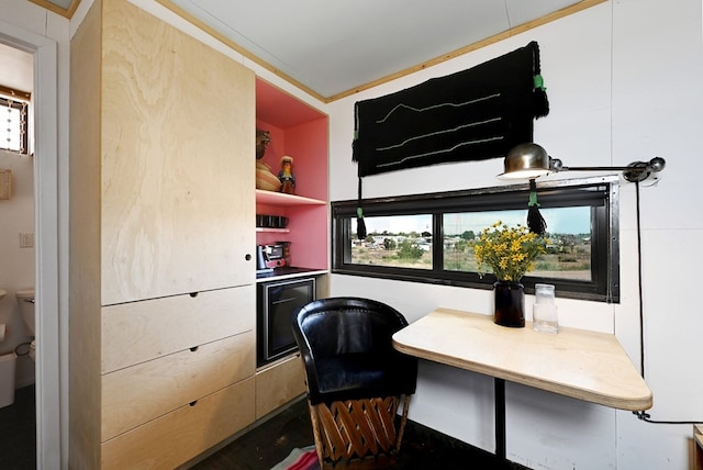 office area with ornamental molding