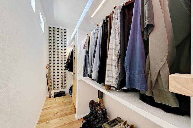 spacious closet with wood finished floors