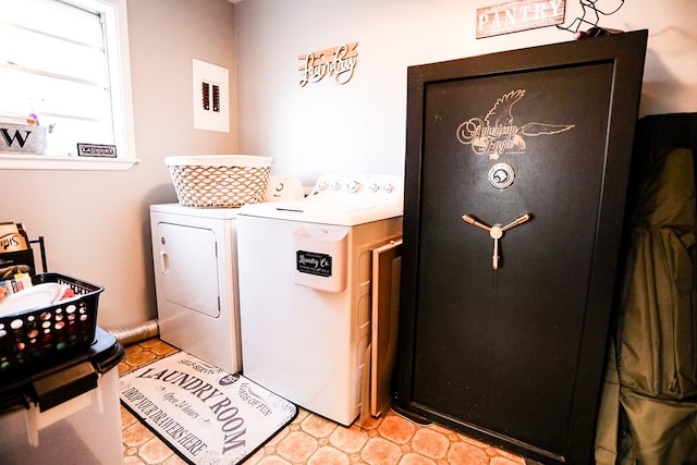 washroom featuring washer and dryer and laundry area