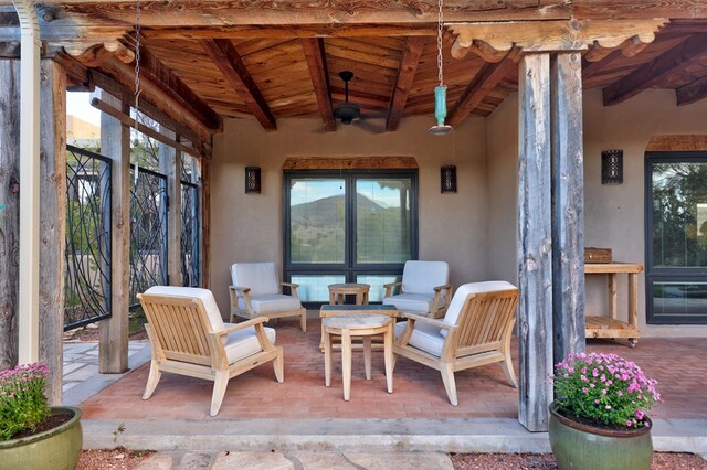 view of patio / terrace featuring ceiling fan