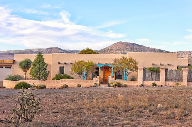 southwest-style home with a mountain view