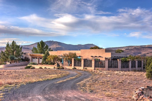 view of front of property with a mountain view