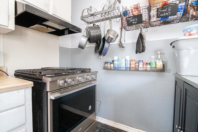 kitchen with white cabinets and gas range