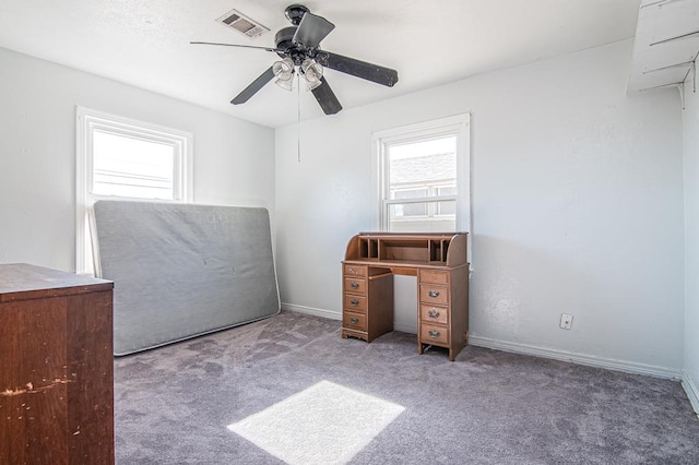 unfurnished bedroom featuring carpet and ceiling fan