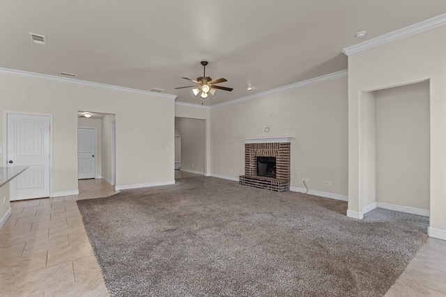 unfurnished living room featuring a fireplace, light colored carpet, ceiling fan, and crown molding